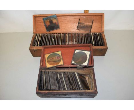 Two cases of glass magic lantern slides