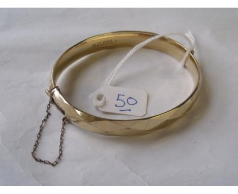 Faceted rolled gold bangle      