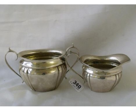 Boat shaped sugar basin with matching cream  jug 6” over handles Birm 1919  250g     