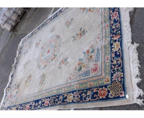 Another Chinese carpet with blue border 12’x9’   