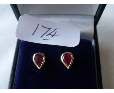 9ct ruby mounted stud earrings     