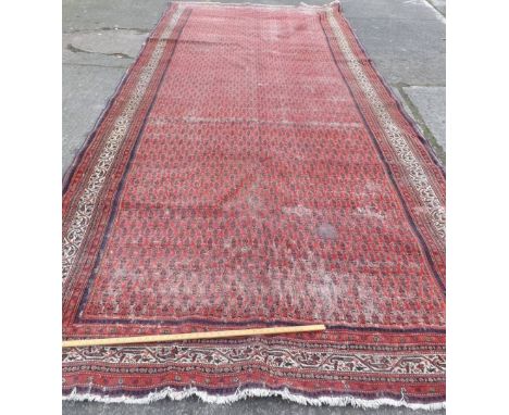 Red round corridor carpet with hook designs 18’x7’  