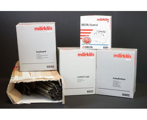 Three boxed Marklin Digital accessories to include 6021 Control Unit, 6040 Keyboard and 6002 Transformer plus a boxed Marklin