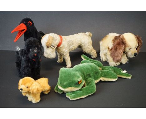Four Steiff Animals including Frog, Hucky the Raven no.7317 and Two Spaniel Dogs (all with buttons in ears) together with a S