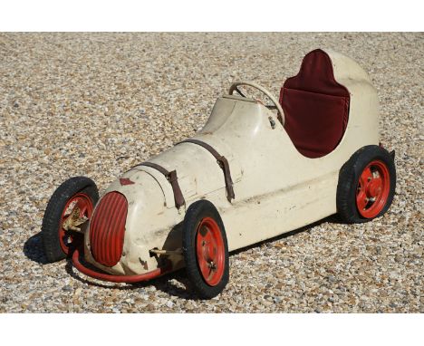 Circa 1950 Austin Pathfinder, child's pedal car, bodywork painted in cream with bonnet badge, windscreen and brown leather st