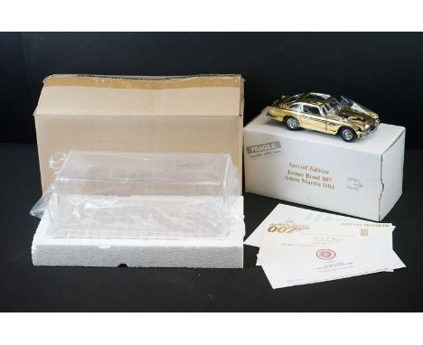 Boxed Danbury Mint Special Edition James Bond 007 Aston Martin DB5 diecast model, 1:24 scale, plated in 22 carat gold, with C