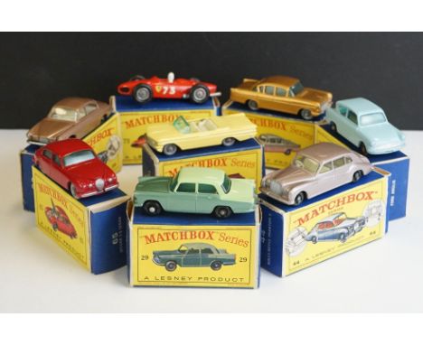 Eight boxed Matchbox 75 Series diecast models to include 65 Jaguar 3.8 Sedan in red, 7 Ford Anglia in pale blue, 22 Vauxhall 