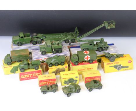 11 Boxed Dinky military diecast models to include 661 Recovery Tractor, 667 Missile Servicing Platform Vehicle, 660 Tank Tran