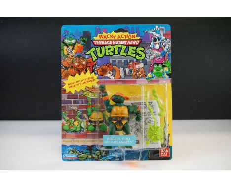 Teenage Mutant Hero Turtles - Original carded Playmates Bandai TNMT Wacky Action Rock n Roll Michaelangelo figure, punched, U