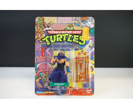 Teenage Mutant Hero Turtles - Original carded Playmates Bandai TNMT Shredder figure, unpunched, 20 back, UK 'Hero' version, e