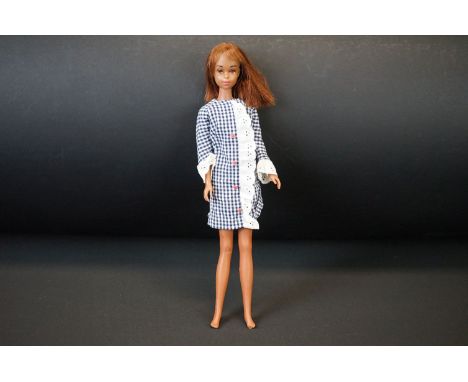 Original Mattel Francie doll marked 1966 Japan, cut hair, hole/tear below the right knee/hamstring, otherwise gd with a few m