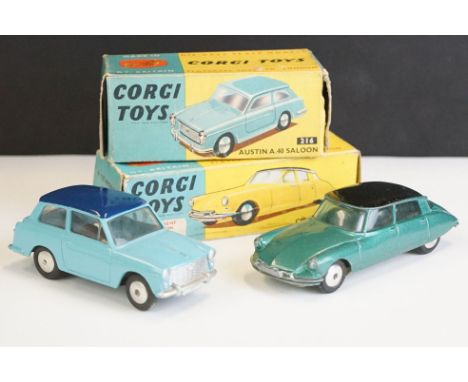 Two boxed Corgi diecast models to include 210S Citroen DS19 in metallic green with black roof (shows play wear) and 216 Austi