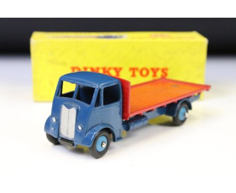 Boxed Dinky 432 Guy Flat Truck diecast model in blue cab &amp; chassis with red bed and light blue hubs, diecast vg with a fe