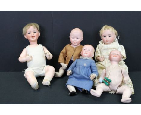 Five Bisque Head Baby Dolls, including three Gebruder Heubach with impressed numbers 0 , 2/0 and 5, largest 23cm high and two