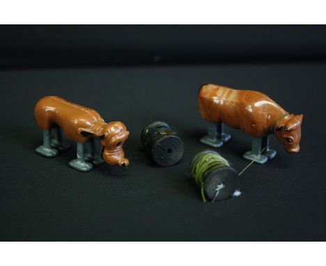 Two original 'Ramp Walker' plastic &amp; metal toys, circa 1940sto include Disney Pluto and cow, both unmarked, both with str