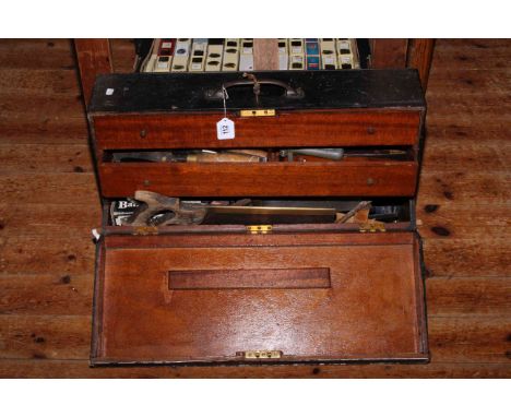 Box of tools including Stanley plane, t-square, saw, etc.