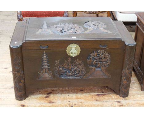 Carved Eastern camphorwood trunk with bowed ends, 57cm by 101cm.