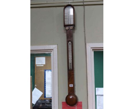 L. Casella, London antique walnut stick barometer.