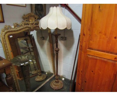 A gilded standard lamp with shade      