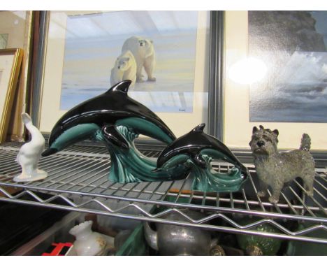 A quantity of ceramics including Poole dolphins and Goebel terrier figurine.     
