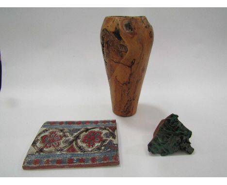 A decorative pottery tile, a wooden vase and an ink block (3) 