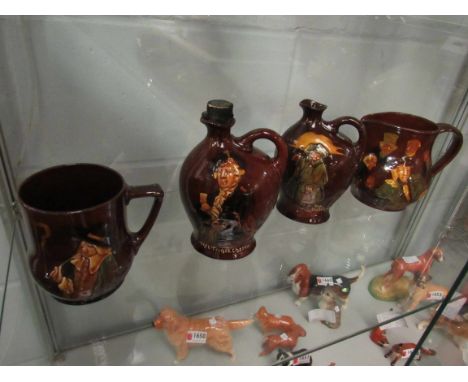 Three Royal Doulton Dewars Scotch Whisky jugs including "Bonnie Prince Charlie", "The Watchman", and "Memories", together wit