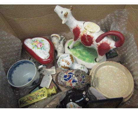 A box containing assorted items including a 19th Century cow creamer, a porcelain patch box, miniature vases and paintings   