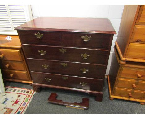 A George III mahogany chest of two short over three graduating long drawers on bracket feet, 96cm x 52cm x 92cm, side feet pa