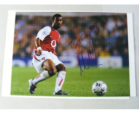 Football: Signed Photograph of Ashley Cole playing  for Arsenal circa 2003/2004, t/w certificate of  authenticity.