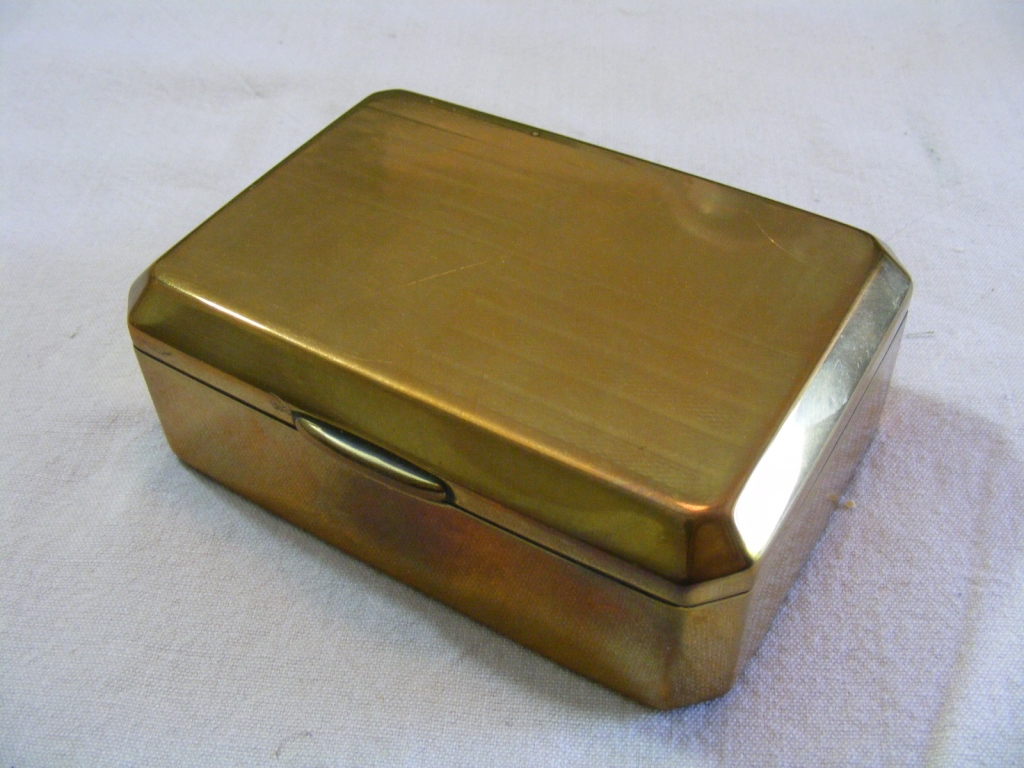 A brass CIgarette Box, stamped beneath for Marcovitch Black and White ...