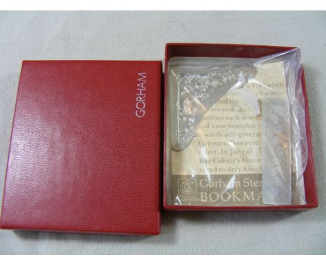A modern white metal Bookmark, stamped "Gorham  Sterling 70", boxed, together with a small  mother-of-pearl inscribed panel.