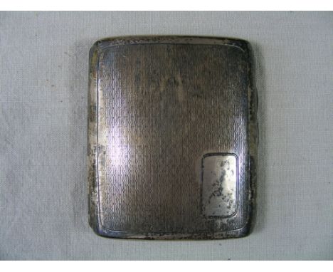 A silver Cigarette Case, with engine turned  decoration and vacant cartouche, hallmarked for  Birmingham 1926, approx 9cm x 7