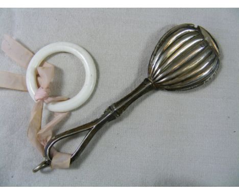 A vintage silver Rattle, hallmark worn, probably  circa mid 1900s. Approx 14cm.