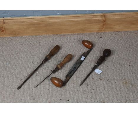 Four various wooden and metal tools, to include two screwdrivers (4)