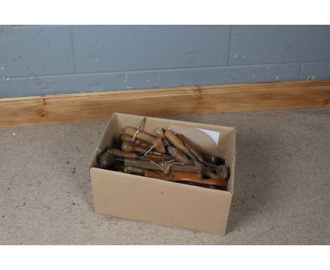 Collection of wooden handled hand tools, consisting of a mallet, hand drills, hammers, chisels etc. some marked Spear &amp; J