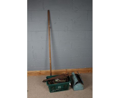 Cantilever tool box and a crate of various hand tools, saws, vice etc. and a wooden handled rake(qty)