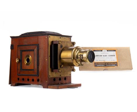 LATE 19TH/EARLY 20TH CENTURY MAGIC LANTERN,by A.M Baird of Edinburgh, in lacquered brass and mahogany, 43cm long, in partial 