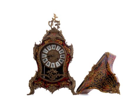 BOULLE WORK MANTEL CLOCK,with gilt brass inlay and mounts, the enamelled chaptering set with Roman numerals, striking on a be