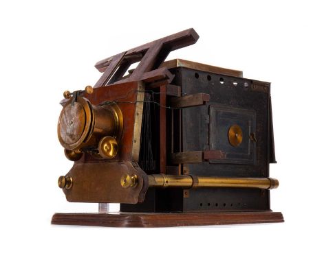19TH CENTURY MAGIC LANTERN,in mahogany, brass and lacquered tin, unmarked, 40cm long, accompanied by a collection of approxim