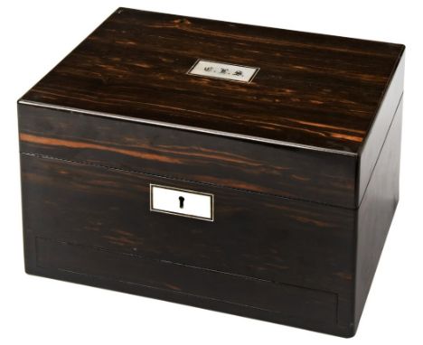 A VICTORIAN COROMANDEL VANITY BOX the lid with mother of pearl initialled plaque, the fitted interior with lift-out try and a