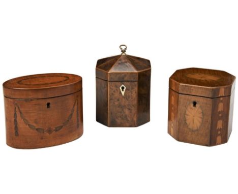 A GEORGE III WALNUT OCTAGONAL TEA CADDY with strung decoration, another octagonal caddy with inlaid pateras and hairbells and
