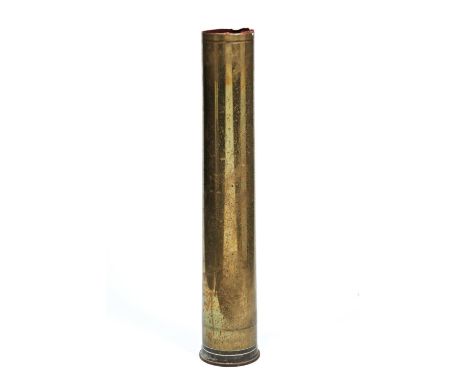 A LARGE BRASS SHELL CASE marked RLB 1963 QX 1235, used as a stick stand 79 cm high 