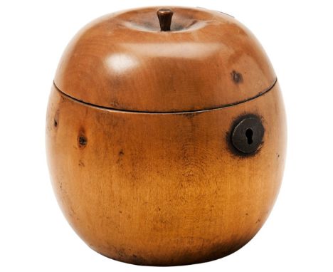 A GEORGE III STYLE APPLE SHAPED FRUITWOOD TEA CADDY with short stalk, steel escutcheon and heavily degraded foil-lined interi