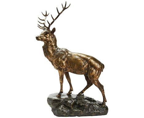 AFTER JULES EDMOND MASSON GRAND CERF SUR UN ROCHER a patinated bronze stag upon a naturalistic rock base 61 cm high x 39 cm w