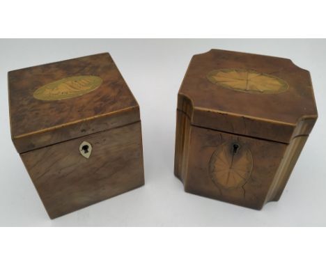 A GEORGE III WALNUT VENEERED TEA CADDY  with patera inlay and canted line inlaid corners and another George III caddy with sh