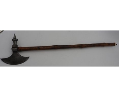 A CONTINENTAL STEEL BATTLE AXE LATE 18TH/19TH CENTURY  with blade opposed by a spike and mounted on a bamboo shaft with bone 