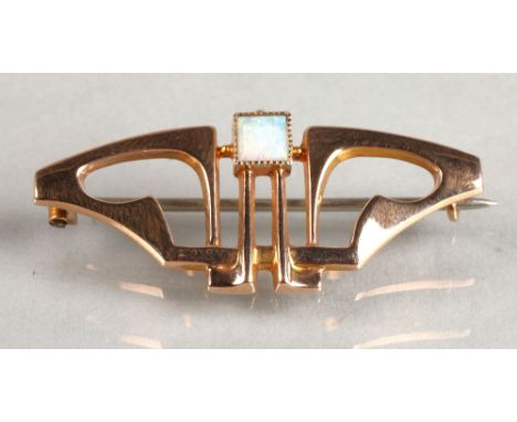 Murrle Bennett 9ct gold bar brooch set with an opal, 2.2 grams. Condition Report: Good condition