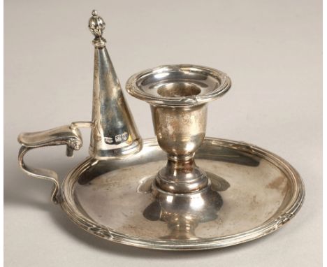 Silver chamber candlestick, assay marked London 1902, weight 293 grams. 
