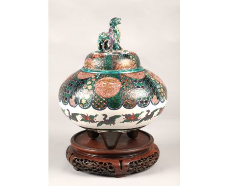 Japanese pottery censer with cover, finial with two dragons, marks to base,&nbsp; on hardwood stand, 33cm high(not including 