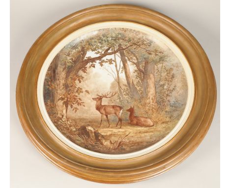 Continental hand painted ceramic wall charger, framed, "Deer in Woodland" indistinctly signed, labels verso, (London Internat